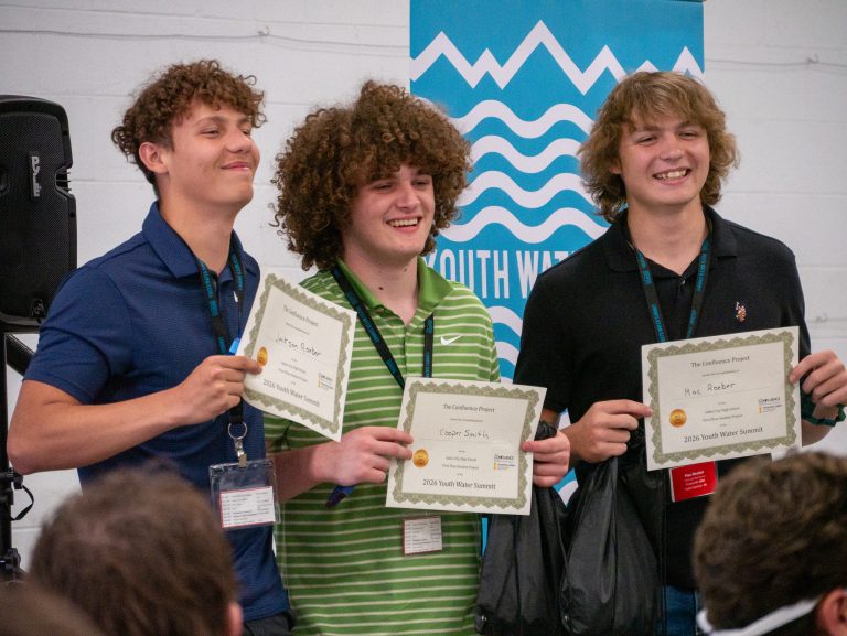 First place YWS students hold certificates.